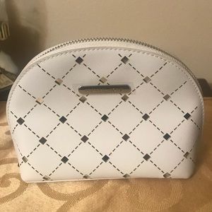Michael Kors white and silver cosmetic bag. NWOT.